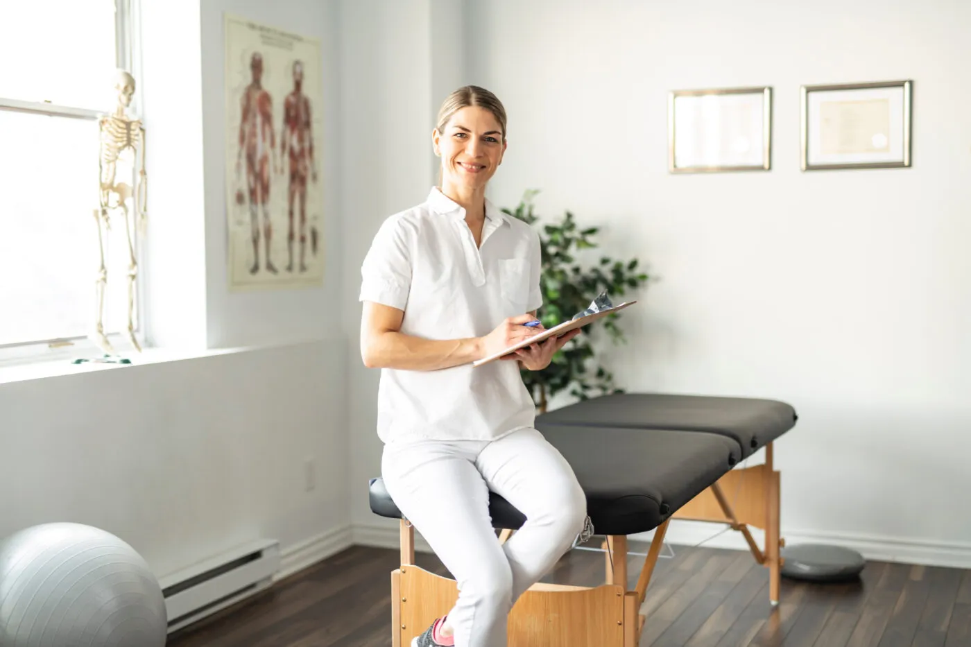 A Modern Rehabilitation Physiotherapy Woman Worker At Job